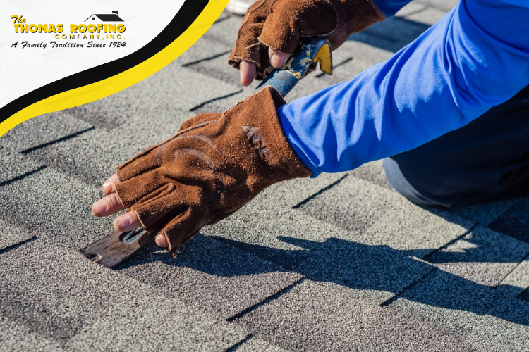 Expert roof repair team in Towson assessing winter damage