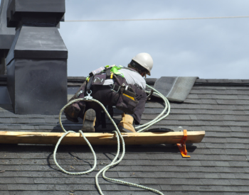Thomas Roofing team conducting roof repairs